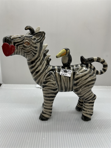 Zebra med tukan og hjerte